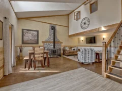 LIVING AND DINING AREA WITH FIREPLACE